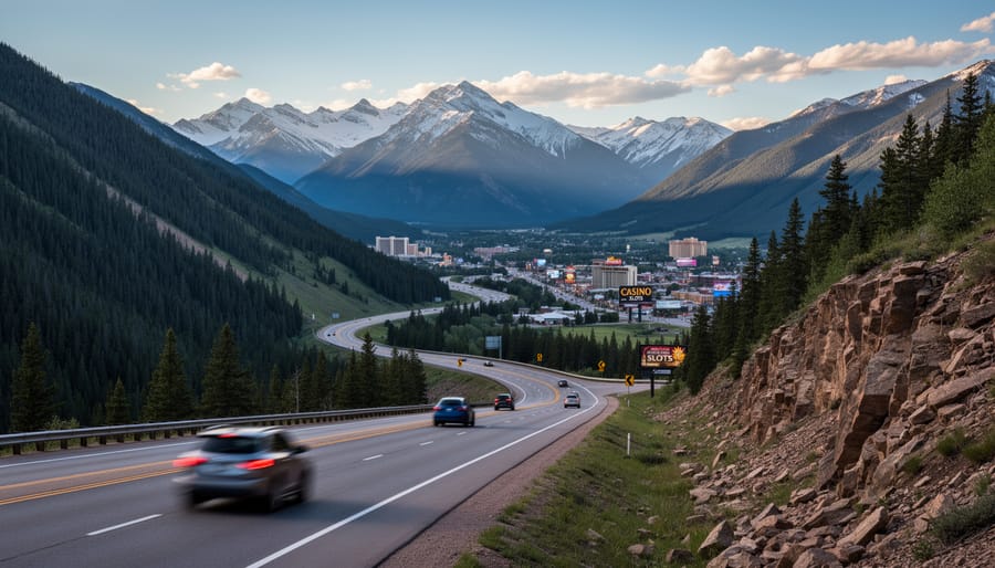 Scenic winding mountain highway through Colorado Rockies with pine forests and peaks